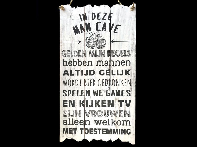 Langwerpig wit bord met de tekst man cave